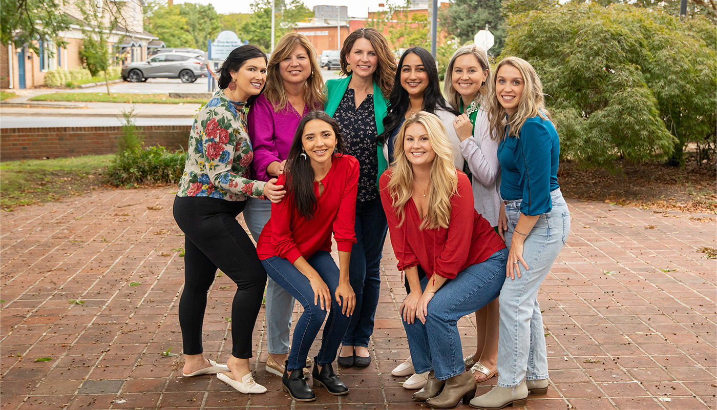 Cambridge dentist and team at Harbor Dental Center smiling