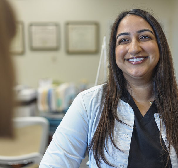 Close up of female dentist smiling