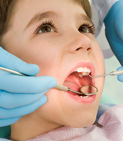 Close up of child during dental checkup