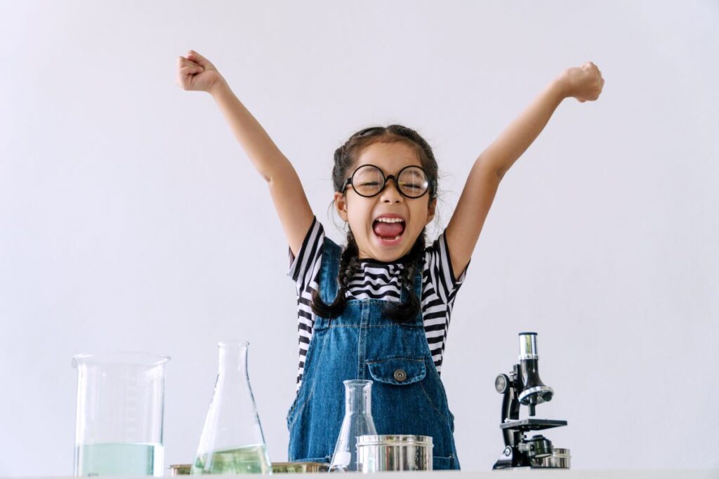 A little girl conducting a science experiment.